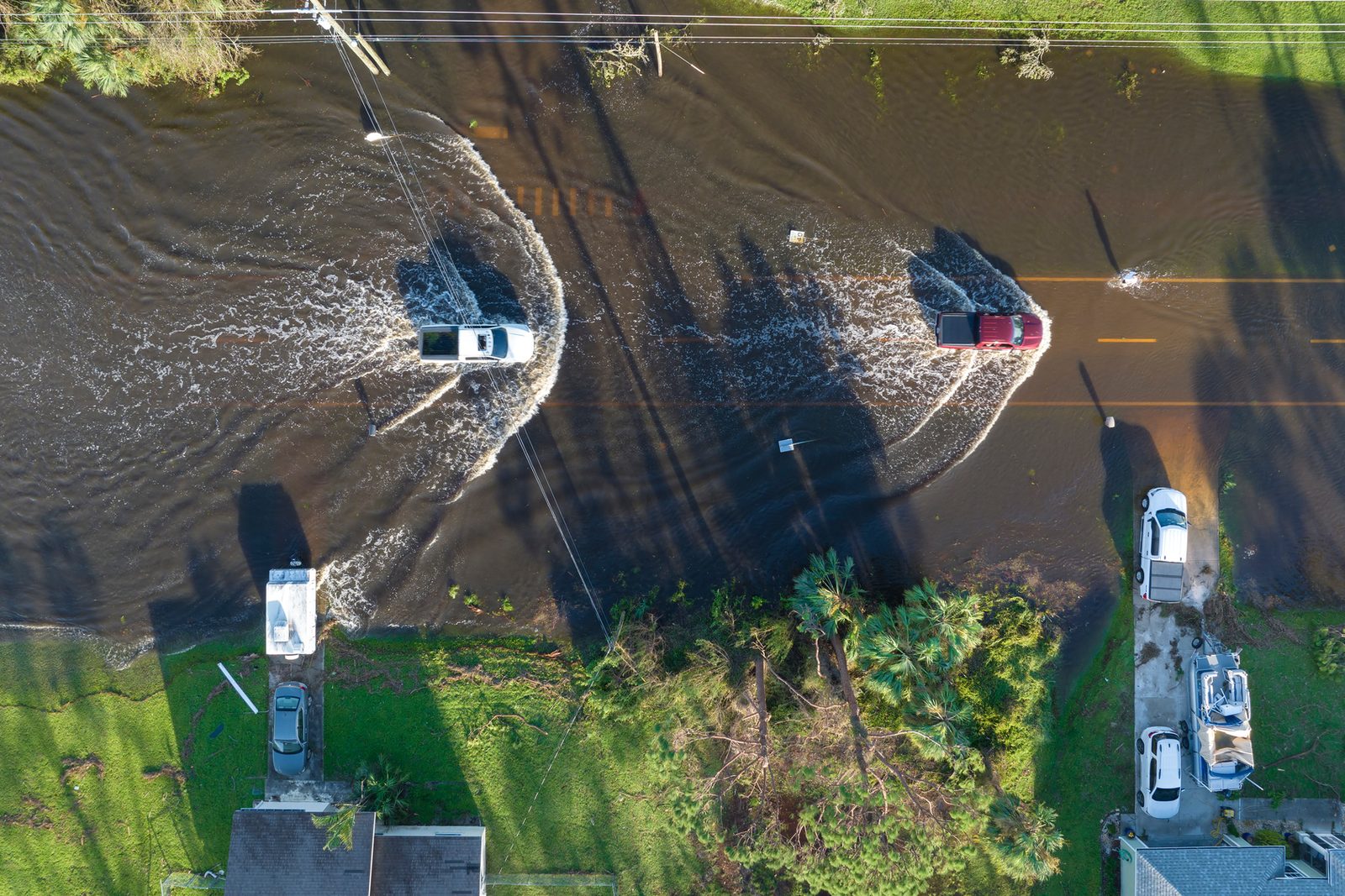 Aerial view of a flooded suburban street after a storm